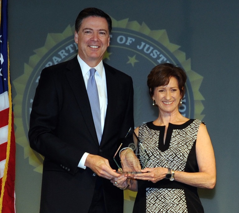 Lynne Marie McLean Receives Director’s Community Leadership Award from Director Comey on April 15, 2016