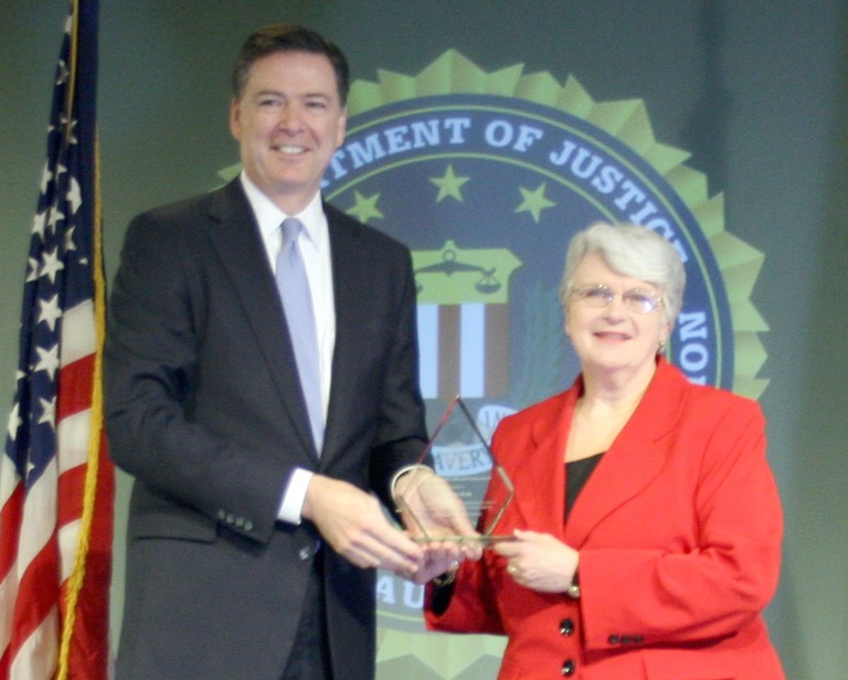 Martha Peek Receives Director’s Community Leadership Award from Director Comey on April 15, 2016