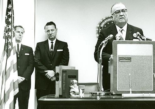 Cartha “Deke” DeLoach, center, joins FBI Director J. Edgar Hoover and Roy Moore, special agent in charge of the Jackson Field Office, during a ceremony in Jackson, Mississippi on July 10, 1964.