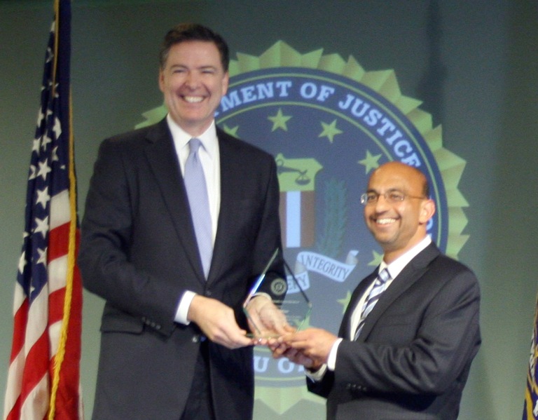 Omar Siddiqui Receives Director’s Community Leadership Award from Director Comey on April 15, 2016