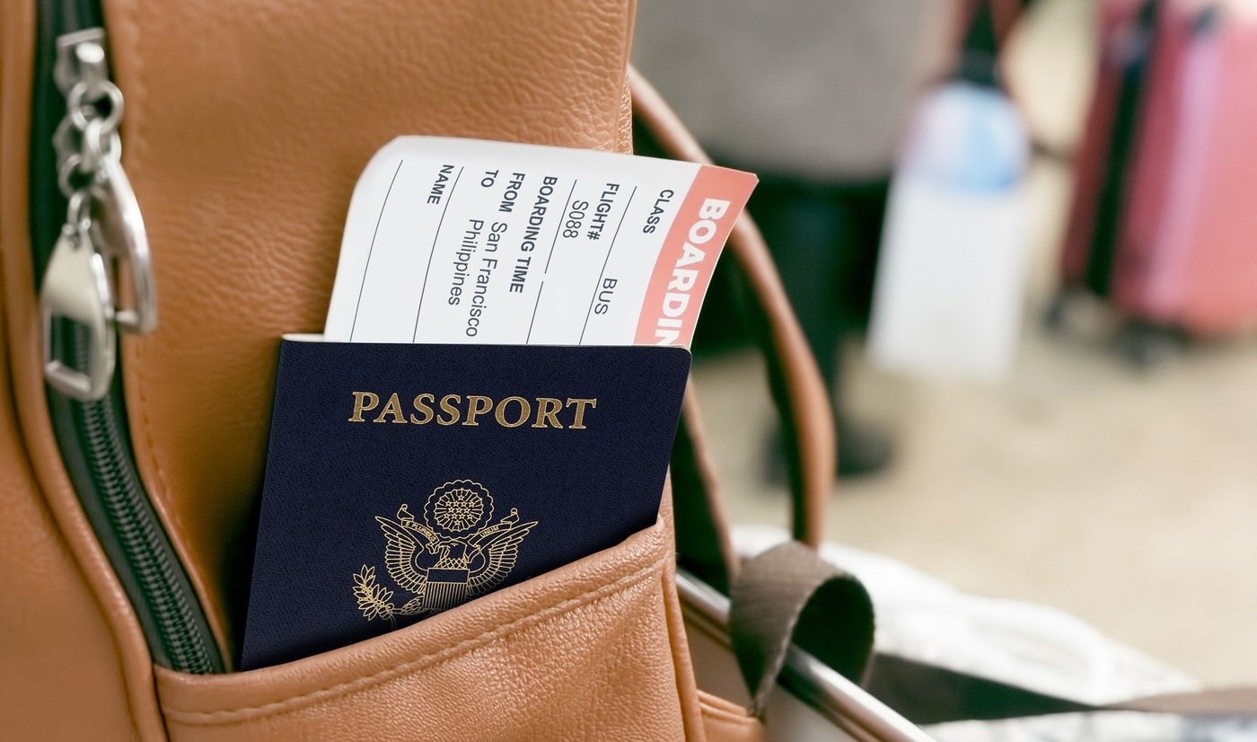 Passport and Boarding Pass in Bag (Stock Image)