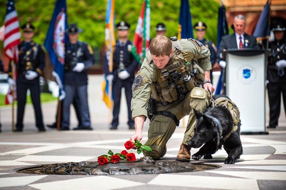 A police officer and his working dog at the National Law Enforcement Officers Memorial on May 11, 2024 for a National Police K9 Memorial Service.