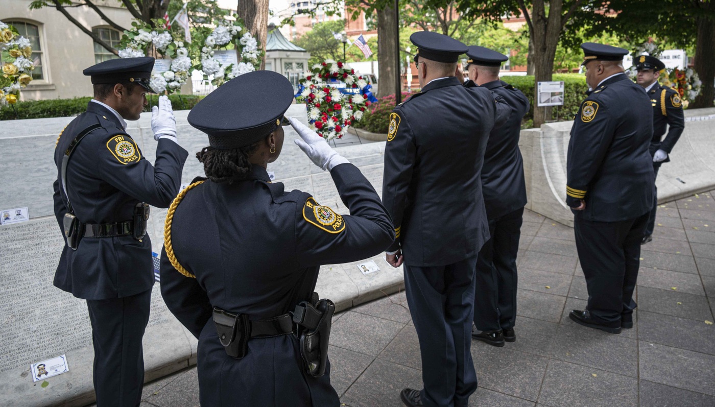 FBI Police salute fallen colleague, Supervisory FBI Police Officer Yiu Tak Tao, whose name was added this year to the National Law Enforcement Officers Memorial.