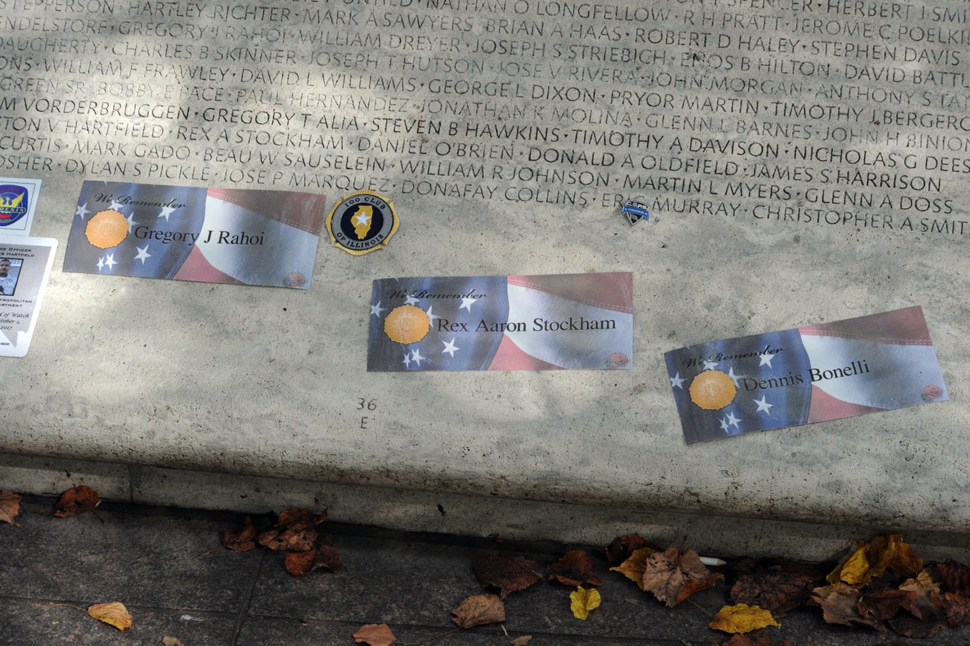 Mementos remembering fallen FBI personnel are seen at the National Law Enforcement Officers Memorial wall in Washington, D.C. during National Police Week observations on October 14, 2021.