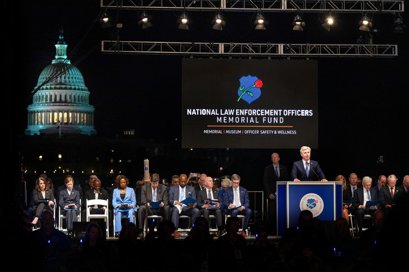 Director Wray speaks at a candlelight vigil on the National Mall May 13, 2024, in Washington, D.C., during National Police Week.