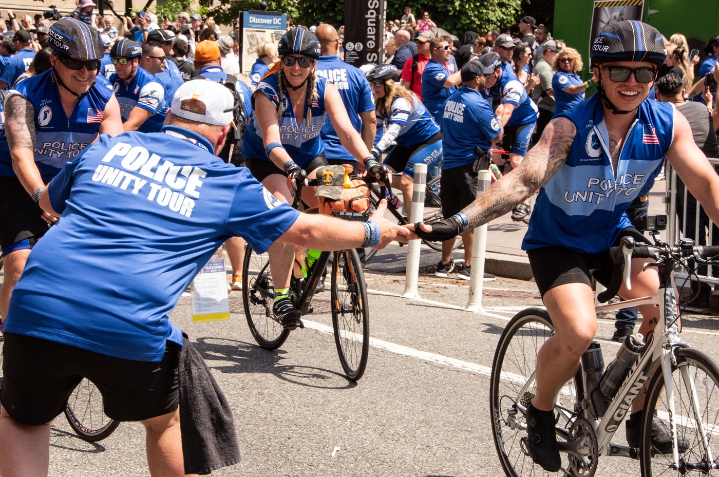 Riders in the Police Unity Tour receive a welcome on May 13, 2023, in Washington, D.C.