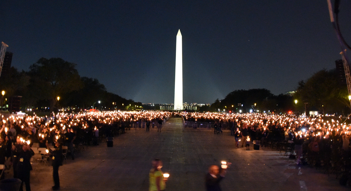 A candlelight vigil in observance of National Police Week on the grounds of the Washington Monument on October 14, 2021.