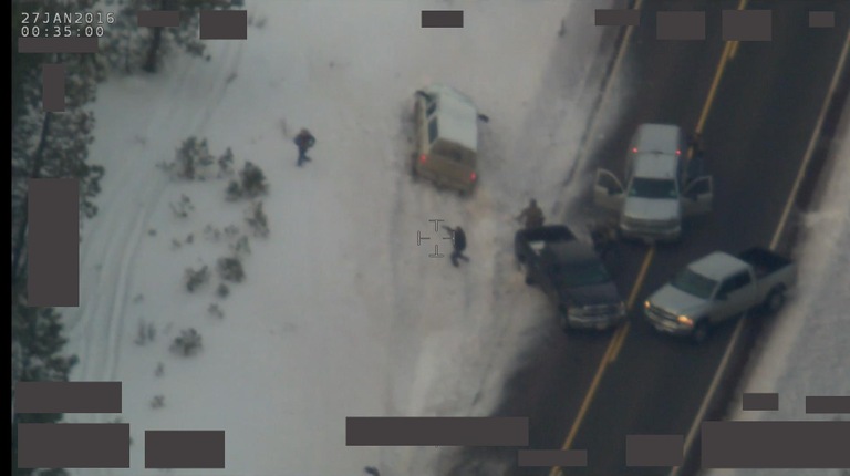 Still picture taken from footage of a joint FBI and Oregon State Police traffic stop and OSP officer-involved shooting of Robert “LaVoy” Finicum along Oregon Highway 395 near milepost 50 in Harney County on January 26, 2016. Note regarding date/time stamp in the left corner of photo: Pilots use Zulu Time, also known as Greenwich Mean Time (GMT), when they fly. Zulu time is eight hours ahead of Pacific Standard Time (PST). Therefore, although this footage was taken on January 26, 2016 in Oregon, the date/time stamp shows just after midnight January 27, 2016.
