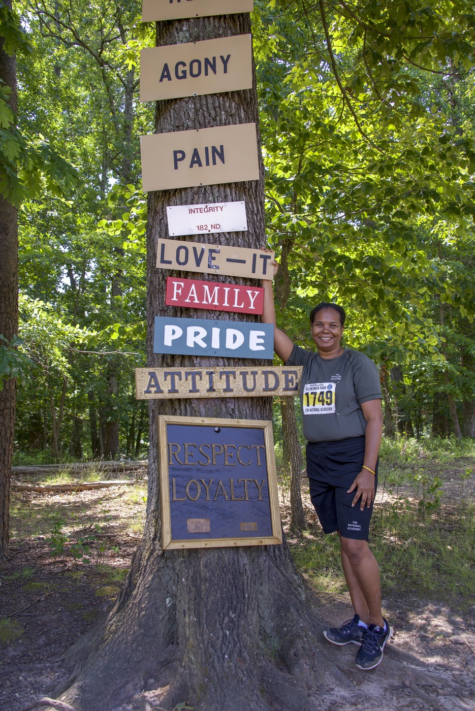 Sherlet Ramclam, an inspector for the Belize Police Department, poses next to a signpost on June 4, 2019, at the FBI's National Academy in Quantico, Virginia.