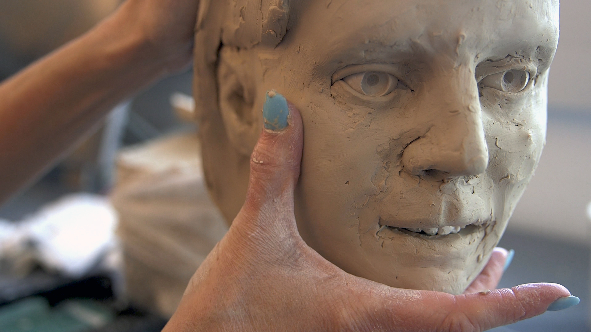 Hands Sculpting on Replica Skull