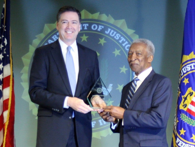 Reverend Cornelius Clark Receives Director's Community Leadership Award from Director Comey on April 15, 2016