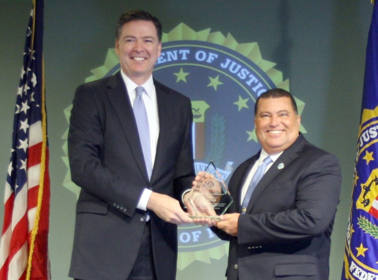 Robert Asseo Receives Director’s Community Leadership Award from Director Comey on April 15, 2016