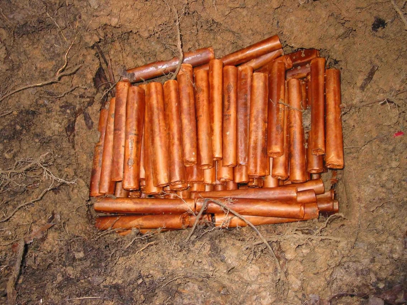 Some of the nitroglycerin dynamite hidden by fugitive Eric Rudolph and recovered by the FBI and other authorities in April 2005. Also located were fully and partially constructed bombs and remote control detonators. Rudolph, who exploded bombs at the Atlanta Olympics and other locations from 1996 to 1998, was captured by a police officer on May 31, 2003.
