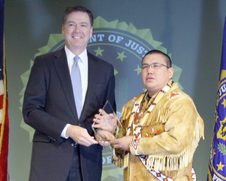 Samuel Johns Receives Director’s Community Leadership Award from Director Comey on April 15, 2016
