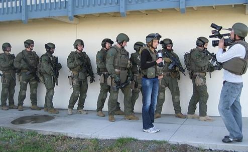 Taping a segment containing FBI SWAT team training for San Diegoas Most Wanted, a 30-minute program that airs Saturday nights. 
