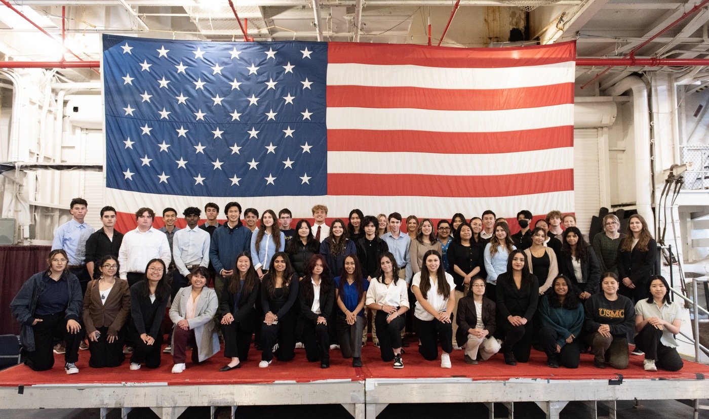 The FBI San Francisco Summer 2023 Teen Academy class poses for a photo onboard the USS Hornet in Alameda, California.