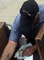 Suspect responsible for robbing the Bank of America branch located at 1350 East Valley Parkway in Escondido, California, on Monday, May 12, 2014.