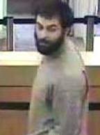 Suspect responsible for robbing the Wells Fargo Bank branch located at 685 Saturn Boulevard in San Diego, California, on Tuesday, October 7, 2014.