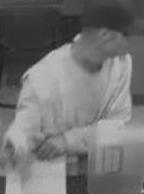 Suspect robbing the Wells Fargo Bank at 7544 Girard Avenue, La Jolla, California, on Wednesday, November 26, 2014. On November 28, 2014, the Chit Chat Bandit also allegedly robbed the Wells Fargo Bank located inside the Vons grocery store at 13439 Camino Canada in El Cajon, California.