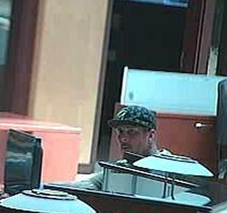 Suspect responsible for robbing the U.S. Bank branch located at 1420 Kettner Blvd. in San Diego, California, on Friday, May 9, 2014.