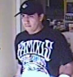 The Risky Business Bandit is believed to be responsible for robbing four banks from April 18, 2014 to Friday, July 25, 2014. Here, he is shown robbing the California Bank and Trust, 16796 Bernardo Center Drive, San Diego, California, on Tuesday, June 27, 2014.