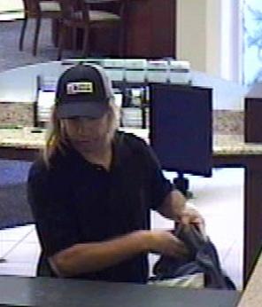 Suspect who robbed the California Bank and Trust branch located at 140 Civic Center Drive in Vista, California, on Friday, August 1, 2014.