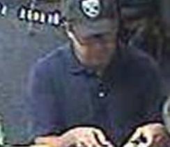 Suspect robbing the U.S. Bank, located at 7700 Carlsbad Village Drive, Carlsbad, California on Tuesday, August 5, 2014. The robber, nicknamed The Hills Bandit, also robbed three banks in the Los Angeles area; one Wells Fargo Bank in on May 16, 2014, and two Citi Banks on July 16, 2014, and July 25, 2014.