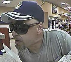 Suspect who robbed the US Bank, located inside of the Vons grocery store 620 Dennery Road, San Diego, California, on Thursday August, 14, 2014.