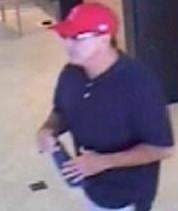 Suspect robbing the California Bank and Trust, 4320 La Jolla Village Drive in San Diego, California, on Monday, August 25, 2014.