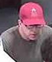 Suspect robbing the California Bank and Trust, 4320 La Jolla Village Drive in San Diego, California, on Monday, August 25, 2014.