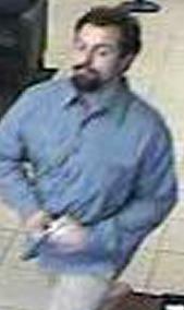 Suspect robbing the Chase Bank, located at 1641 South Melrose Drive, Vista, California, on Wednesday, October 15, 2014. The Bearded Bandit is suspected in two other bank robberies.