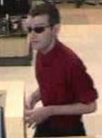 Unknown suspect robbing the U.S. Bank, located inside of Albertsons grocery store, 1133 South Mission Road, Fallbrook, California, on Friday, September 25, 2015.