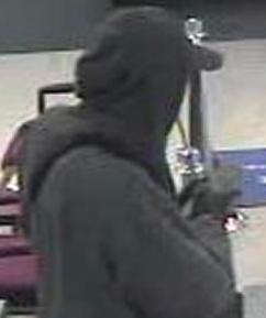 Suspect robbing the U.S. Bank branch, located at 4136 Oceanside Boulevard, Oceanside, California, on Tuesday, December 23, 2014.