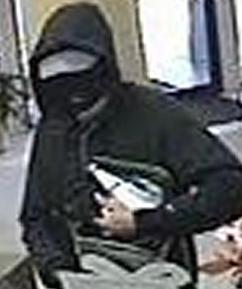 Suspect robbing the U.S. Bank branch, located at 2520 El Camino Real in Carlsbad, California, on Tuesday, January 6, 2015.