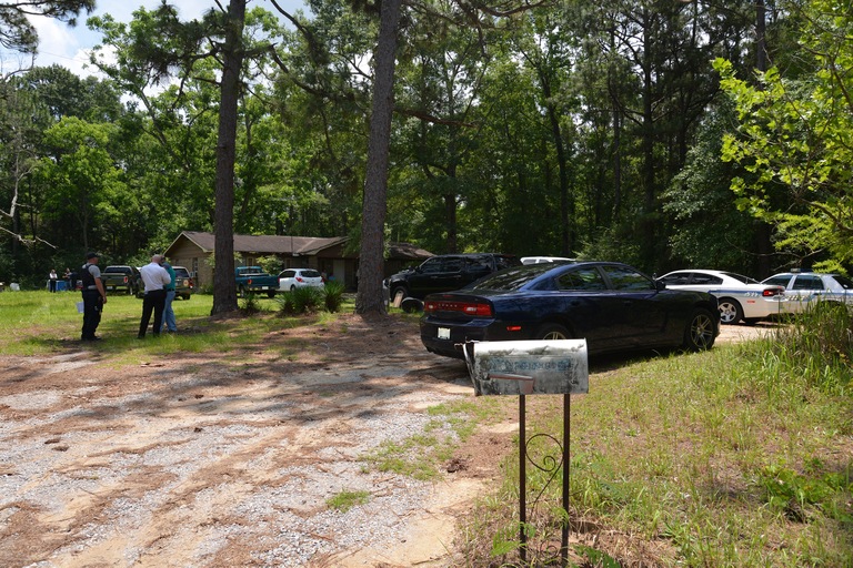 Investigators at the Mississippi property where Mercedes Williamson was murdered by Joshua Vallum in May 2015