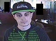 Suspect who robbed an Umpqua Bank at 1900 S. 320th Street in Federal Way, Washington on Friday, July 18, 2014.