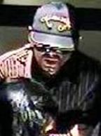 Suspect believed to have robbed at least five different banks within one month, most recently on July 30, 2014 at a Lynnwood, Washington Wells Fargo bank.