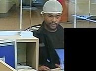 Suspect wanted for his alleged involvement in at least three bank robberies: the Chase Bank, on Gravelly Lake Drive SW, Lakewood, Washington on August 16, 2014; the Bank of America, on 104th Avenue SE, Kent, Washington on August 18, 2014; and the Chase Bank on A Street SE, Auburn, Washington on August 18, 2014.