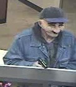 Suspect believed to have robbed at least four different banks, most recently the Key Bank on November 14, 2014 in the Seattle neighborhood Ravenna.