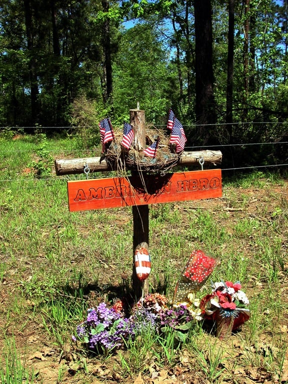 A makeshift memorial in Hemphill, Texas marks where remains of a crew member from the space shuttle Columbia were discovered in February 2003. (NASA Photo)