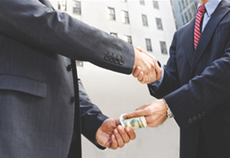 Hands Shaking and Exchanging Money (Stock Image)