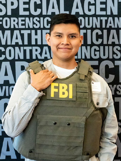 On September 17, 2022, Community Outreach Specialists assigned to FBI Albuquerque and FBI Denver collaborated to host the first-ever joint FBI Teen and Collegiate Academy in the Four Corners area. The day-long event was held at Fort Lewis College in Durango, Colorado. At the end of the daylong event, students were able to try on FBI tactical gear and pose for photographs.