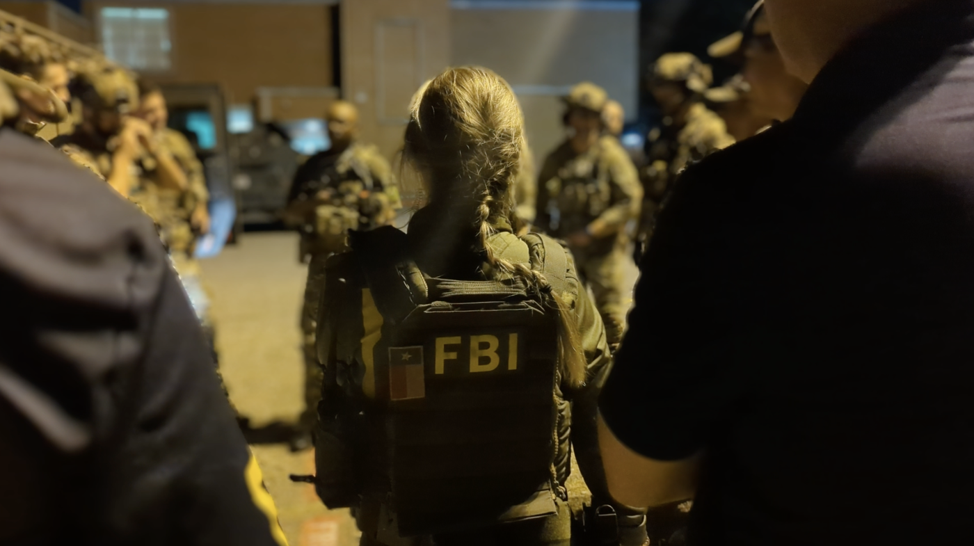 FBI personnel and SWAT operators in Pre-Dawn Preparations