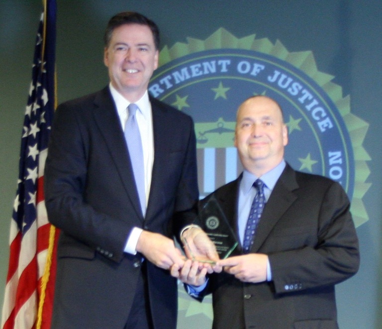 Dr. Thomas Haveron Receives Director’s Community Leadership Award from Director Comey on April 15, 2016