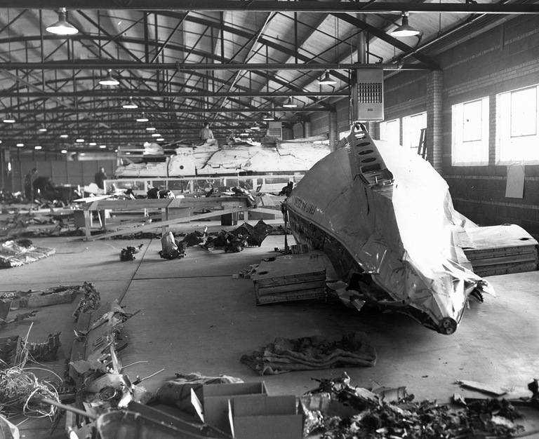Wreckage of United Airlines flight 629 that crashed November 1, 1955 in Colorado, laid out in a Denver warehouse to solve the mystery of the bombing by Jack Graham.