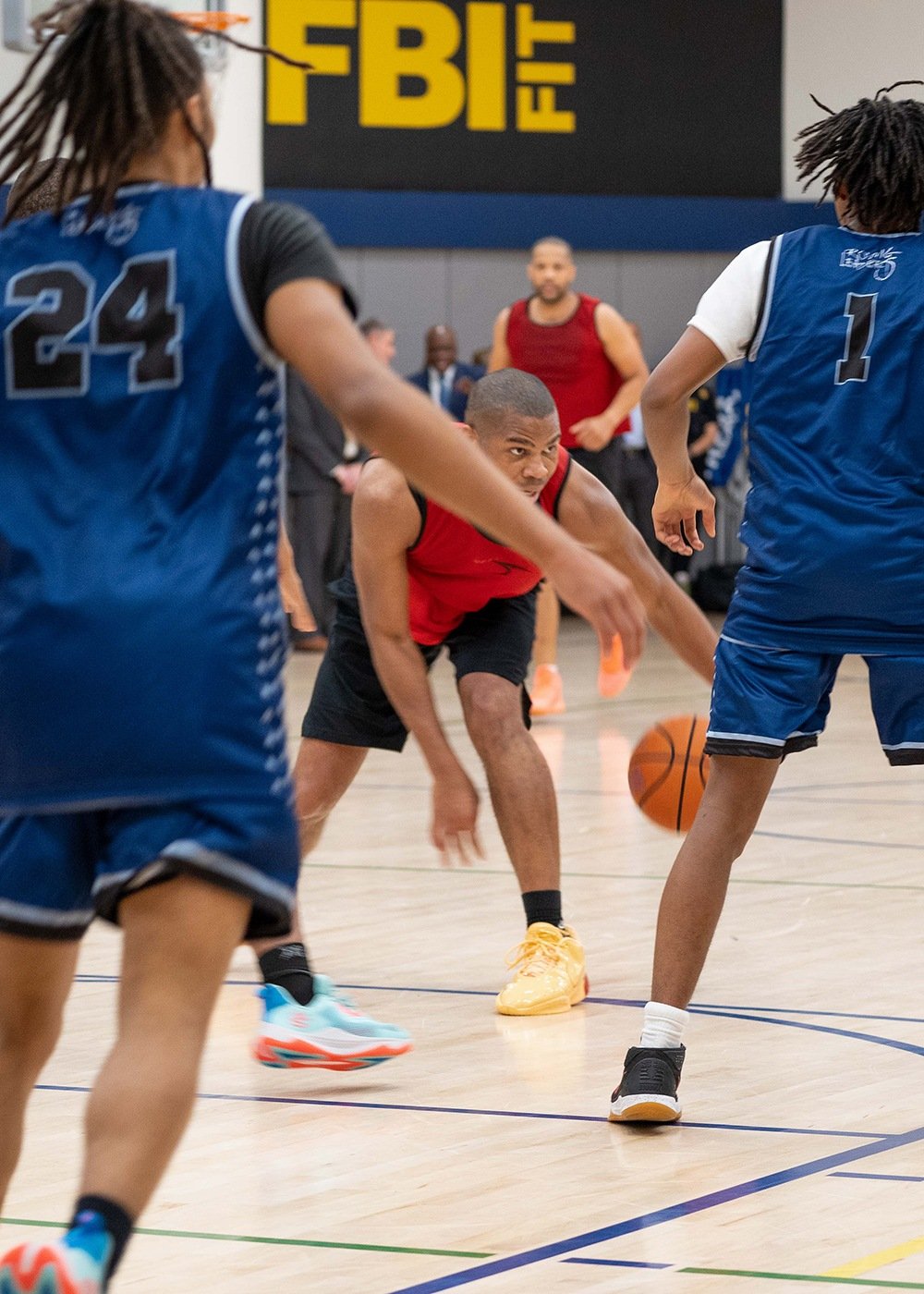 An FBI player dribbles a basketball in a community outreach event at FBI Headquarters on January 26, 2024.