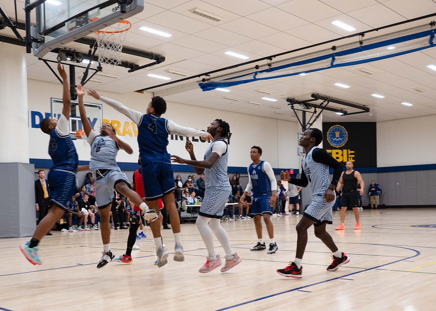 Basketball players compete for a rebound during a WFO community outreach event at FBI Headquarters on January 24, 2024.