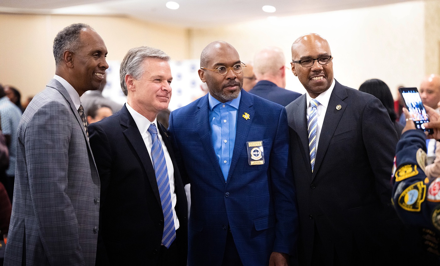 Director Christopher Wray and Robert Contee, assistant director of the Office of Partner Engagement, joined ATF Deputy Director Marvin Richardson (left) and Dr. Jacob Rieux of NOBLE at the International Association of Chiefs of Police conference in San Diego in October.