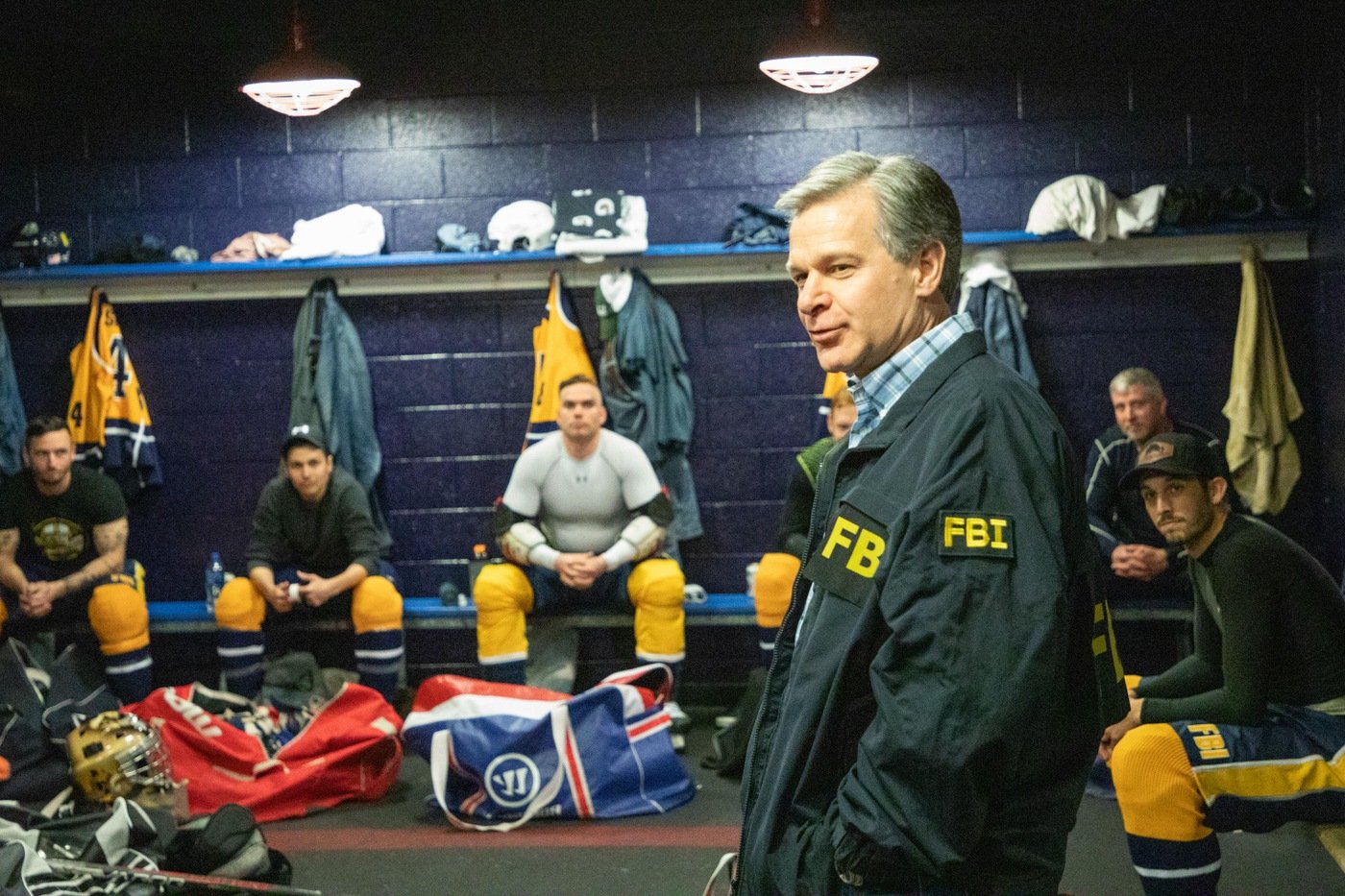 Director Christopher Wray with the FBI hockey team before their game against the U.S. Secret Service on April 30, 2022.