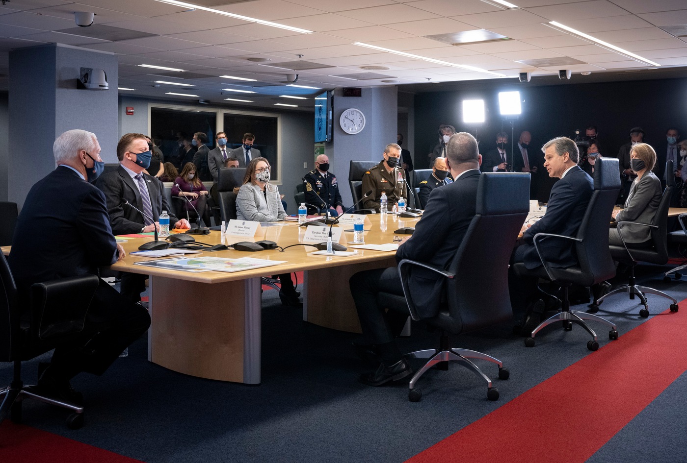 FBI Director Christopher Wray speaks during an inauguration security briefing to Vice President Mike Pence with other agency officials at FEMA Headquarters in Washington, D.C. on January 14, 2021. (Photo courtesy of Department of Homeland Security)